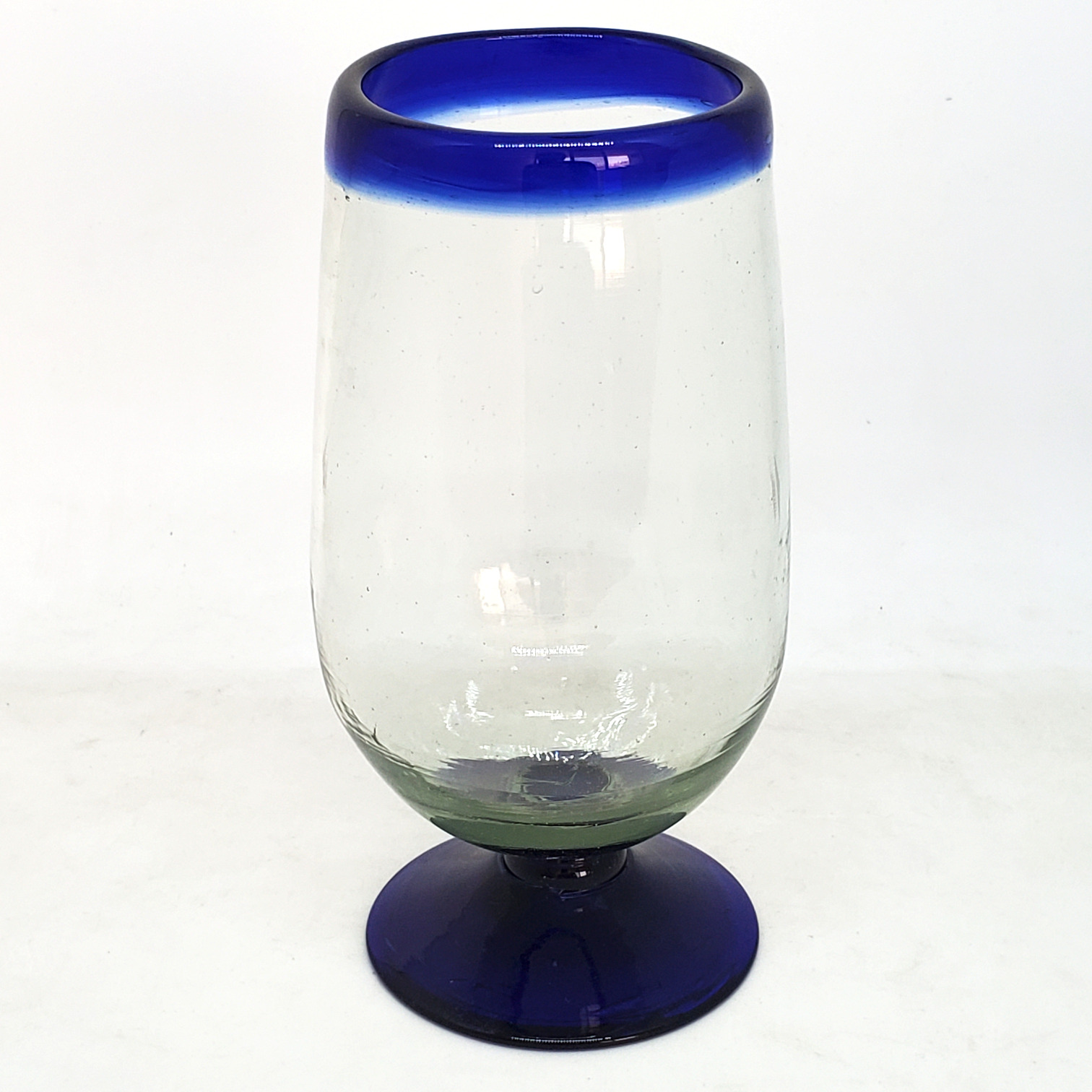 Wholesale Cobalt Blue Rim Glassware / Cobalt Blue Rim 17 oz Tall Water Goblets  / These tall water goblets will embellish your table setting and give it a festive feel. Made from authentic hand blown recycled glass.